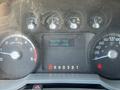 Dashboard of a 2012 Ford F-450 SD showing gauges for RPM speed and fuel along with a digital display indicating engine idle and hours of operation at 3806