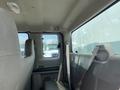 Interior view of a 2008 Ford F-450 SD showing the back seat and seatbelts without any passengers