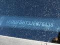 A 2018 Ford F-550 with a visible vehicle identification number sticker on the windshield