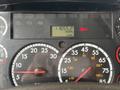 Dashboard of a 2015 Freightliner M2 106 displaying gauges including speedometer odometer and engine hours with warning lights illuminated
