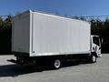 A 2007 GMC W3500 box truck with a large white cargo area and a cab positioned at the front