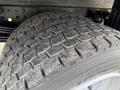 A close-up view of a tire from a 2018 Hino 195 showing the tread pattern and surface details