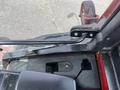 Interior view of a 2012 Toro Groundsmaster 5910 showing the control panel and steering components