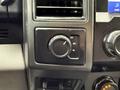 Close-up of the control panel in a 2020 Ford F-550 featuring a dial for selecting 2H 4H and 4L drive modes