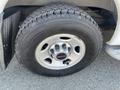 2016 GMC Savana tire featuring a black Goodyear tread design and a metallic wheel with a central GMC logo
