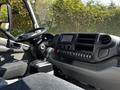 Interior of a 2020 Hino 155 showing the steering wheel dashboard and control panel with various buttons and a screen