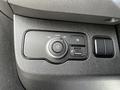 A control panel in a 2020 Mercedes-Benz Sprinter featuring dials and switches for lighting adjustments