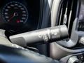 Close-up of a black windshield wiper control stalk featuring settings for off low and intermittent on a 2021 Chevrolet Colorado steering column