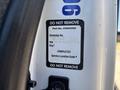 Close-up of a label on a 2018 International DuraStar truck displaying the VIN campaign number and service location code