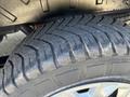 Close-up of a tire from a 2016 Ford Transit showing tread pattern and rubber texture