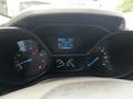 Dashboard of a 2014 Ford Transit Connect displaying speedometer fuel gauge and trip information