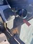Close-up of the control joystick and lever from a 2006 Komatsu PC55MR2 excavator
