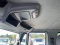 Interior view of a 2007 International 7300 showing the overhead console with a light and storage compartment