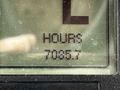 Display screen showing the hours used on a 2012 Toro Groundsmaster indicating 7085.7 hours