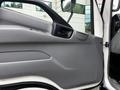 The interior door panel of a 2014 Hino 195 showing a gray finish with a smooth texture and a handle for opening the door