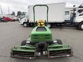 A 2009 John Deere 2653B Precision Diesel Mower with a yellow seat and green body featuring dual front cutting decks and wheel assemblies