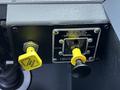 Close-up of control panel on a 2006 Emergency One Fire Truck featuring pump power shift lever and operational instructions for engaging manual and neutral settings