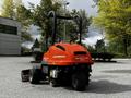 A red 2015 Jacobsen Eclipse 322 lawn mower with three wheel drive features a high handle and a cutting deck at the front
