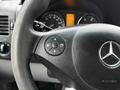 Steering wheel of a 2016 Mercedes-Benz Sprinter with control buttons and an airbag emblem visible