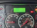 Dashboard of a 2020 Freightliner 114SD displaying engine hours and kilometers driven with various gauges for RPM and speed