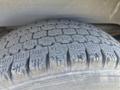 Close-up of a tire from a 2007 Chevrolet Express showing detailed tread patterns designed for traction and performance