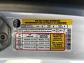 A tire and loading information label for a 2023 Ford Transit displaying seating capacity cargo weight and tire pressure requirements