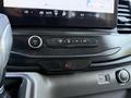 Dashboard controls of a 2022 Ford Transit featuring volume knob climate controls and hazard light button