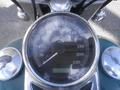 Speedometer of a 2009 Harley-Davidson Flstc showing a maximum speed of 220 km/h with the needle positioned below the 20 km/h mark