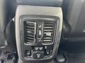 Climate control panel with air vents and USB ports in a 2015 Dodge Durango