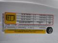 A 2015 Chevrolet Silverado 1500 door sticker displaying tire pressure information and specifications