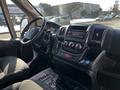 Interior view of a 2017 RAM Promaster with dashboard controls and steering wheel visible