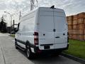 A white 2017 Mercedes-Benz Sprinter van parked on a street view showing the rear and side of the vehicle with the brand logo visible