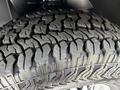 A close-up view of a rugged tire tread from a 2019 Mercedes-Benz Sprinter showcasing deep grooves and patterns designed for traction and durability