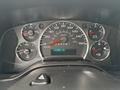 Dashboard of a 2020 Chevrolet Express showing speedometer fuel gauge and other dials with the odometer reading 155585 Km