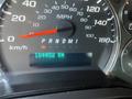 Dashboard of a 2016 GMC Savana showing speedometer and odometer reading 184452 km