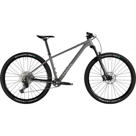 2025 Canyon Grand Canyon AL 6 mountain bike features a grey frame wide tires and a front suspension designed for off-road performance