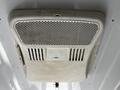 An air conditioning unit mounted on the ceiling of a vehicle