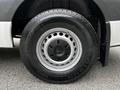 Close-up of a wheel on a 2020 Mercedes-Benz Sprinter showing a silver rim and a black tire with the brand name visible