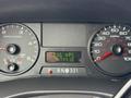 Dashboard of a 2007 Ford F-550 showing speedometer and tachometer along with an odometer reading 1441.8 and a message display