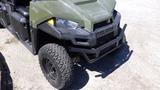 2016 Polaris Ranger 570 Crew in olive green with large black tires and a rugged front grille featuring the Polaris logo