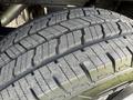 Close-up of a tire from a 2019 Mercedes-Benz Sprinter showing tread pattern and rubber texture