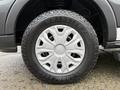 Close-up of a 2018 Ford Transit wheel showing a silver alloy rim and a Goodyear Wrangler tire with a detailed tread pattern