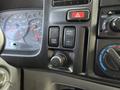 Interior controls and gauges of a 2008 International CityStar with speedometer and fuel gauge visible along with cruise control and air conditioning buttons