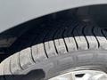 Close-up of a tire from a 2016 Ford Transit showing tread pattern and sidewall details