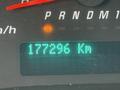A digital odometer display showing a reading of 177296 kilometers in a 2015 Chevrolet Express