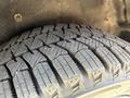 Close-up of a tire with deep treads mounted on a 2021 Ford Transit Connect emphasizing grip and traction for various road conditions