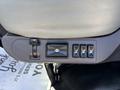 Control panel of a 2015 Freightliner M2 106 featuring switches and buttons for adjusting seating functions