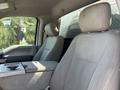 Interior of a 2019 Ford F-550 with gray fabric seats featuring a center console and headrests