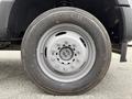 Close-up of a wheel from a 2020 Ford F-550 featuring a five-spoke gray rim and a Conti Hybrid HS3 tire with visible treads