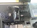 Interior view of a 2007 Morgan Olson Workhorse W42 dashboard featuring gear shift lever gauges and control buttons